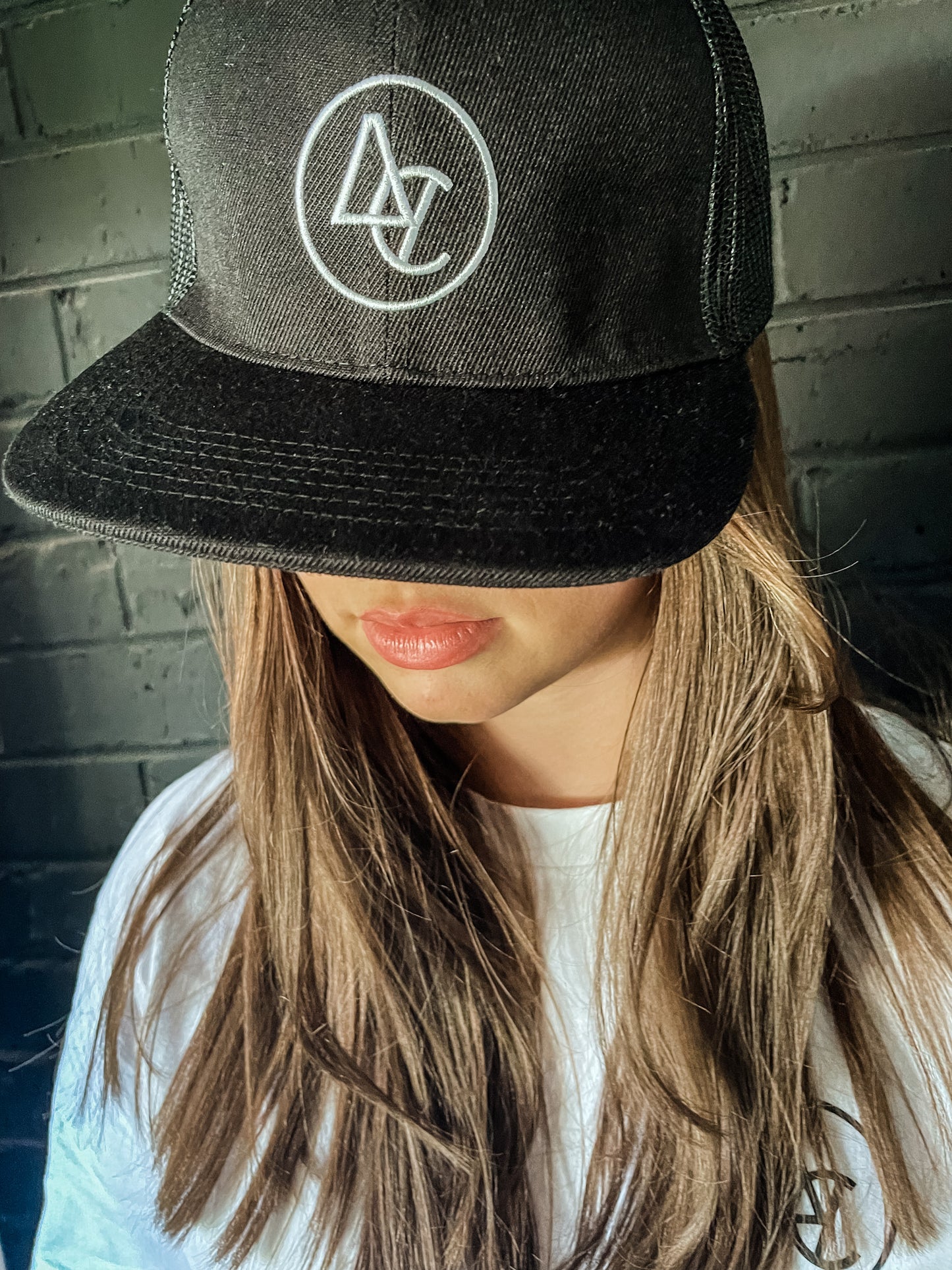 Black trucker hat