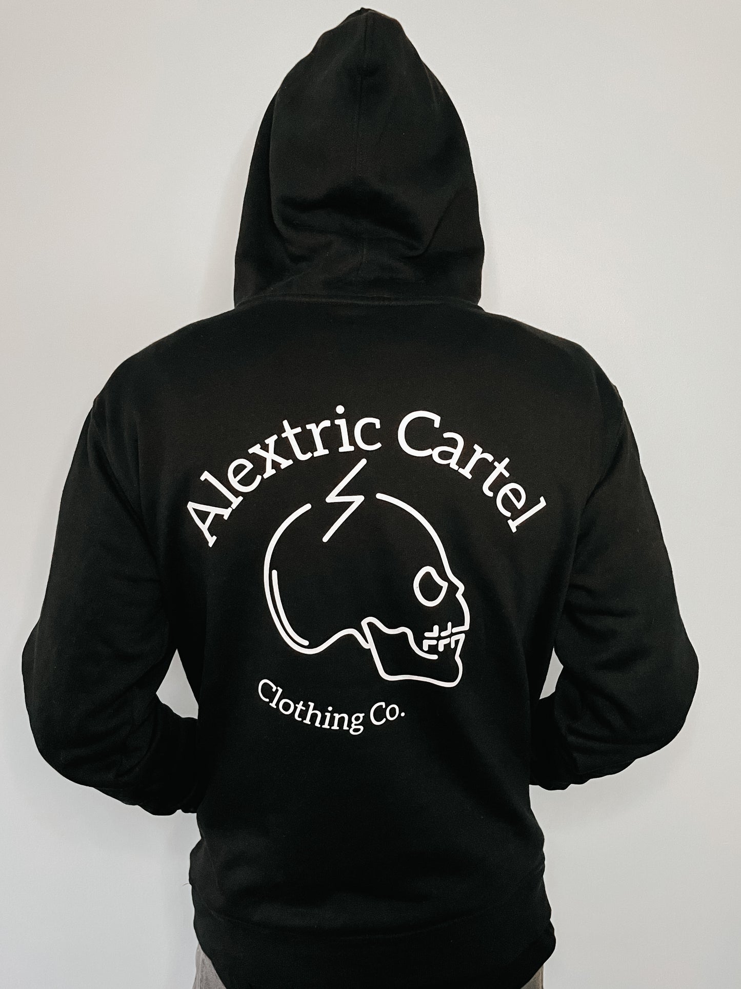 Black hoodie with graphic skull print on back