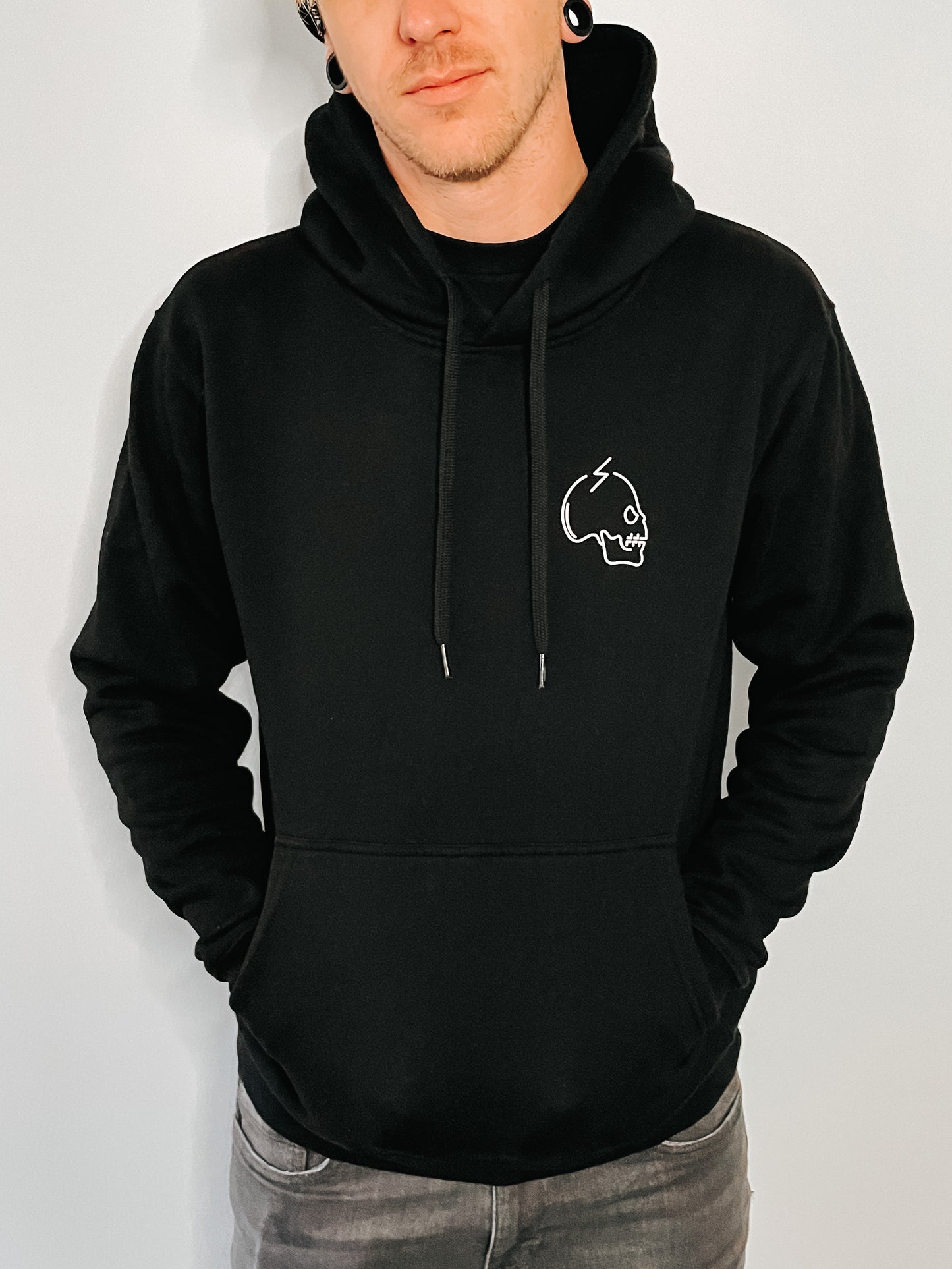 Black hoodie with skull on it. Alextric Cartel jumper